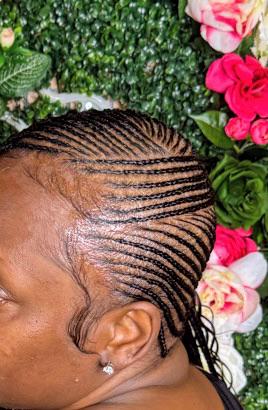 Side cornrow detail at Braids by estal