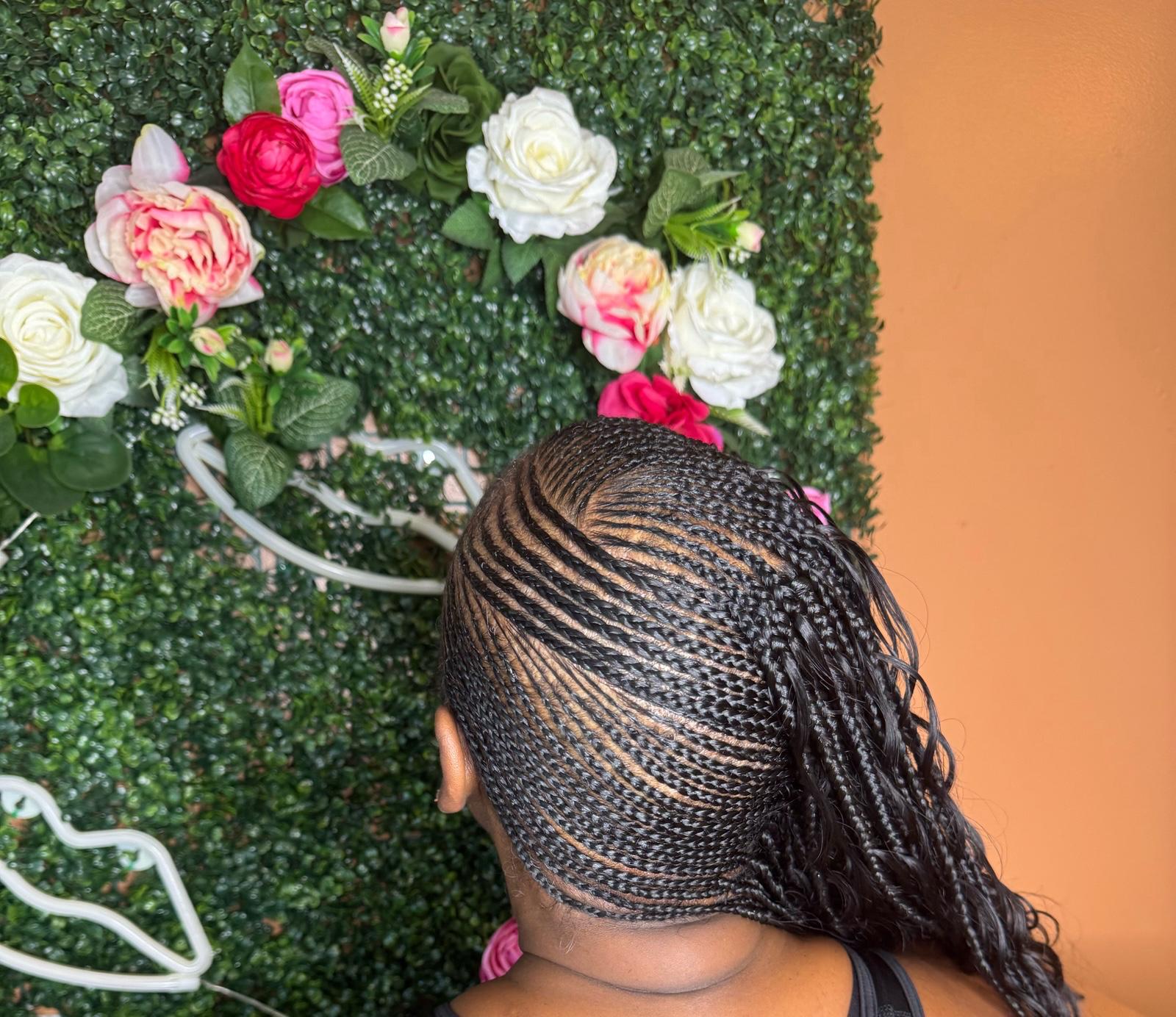 Side cornrows back view at Braids by estal