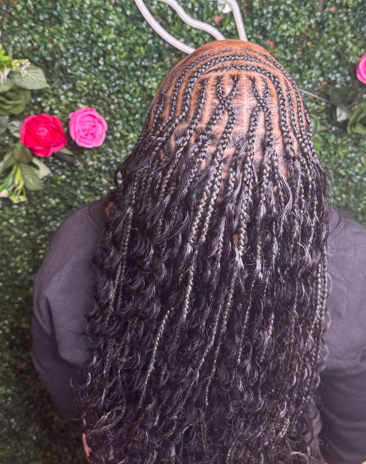 Small knotless braids with curly ends at Braids by estal