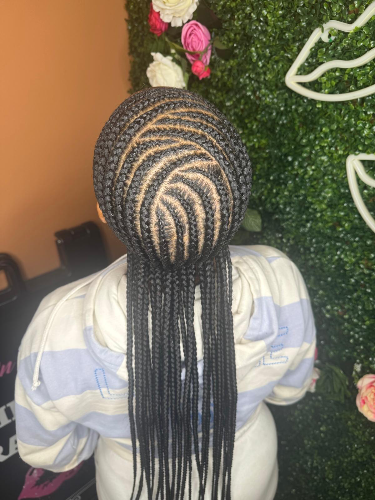 Spiral cornrow design at Braids by estal