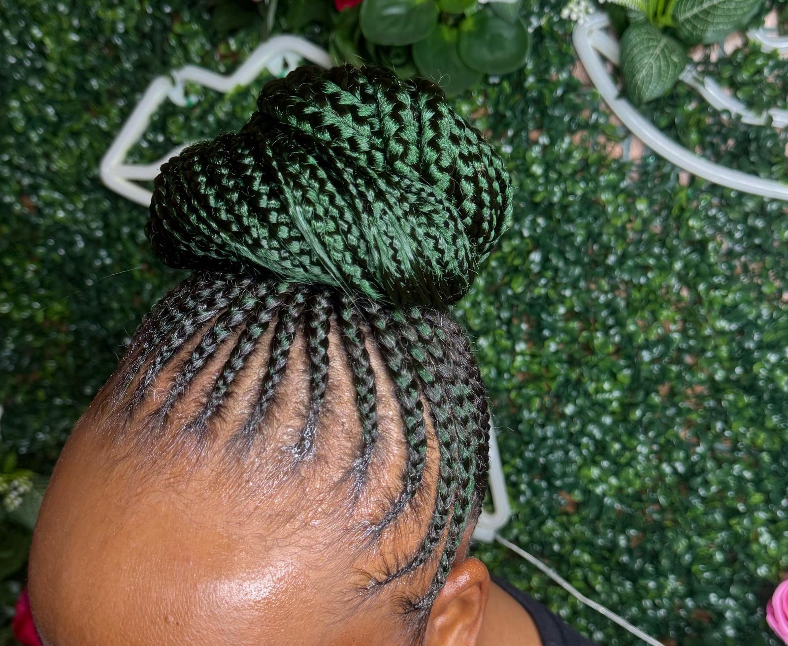 Braided updo bun second view at Braids by estal